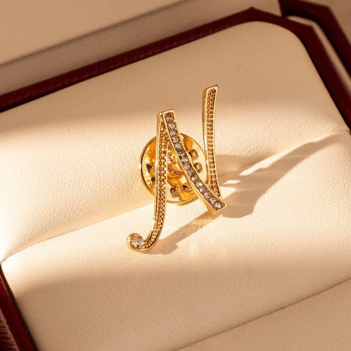 Broche en strass avec initiale 26 en or