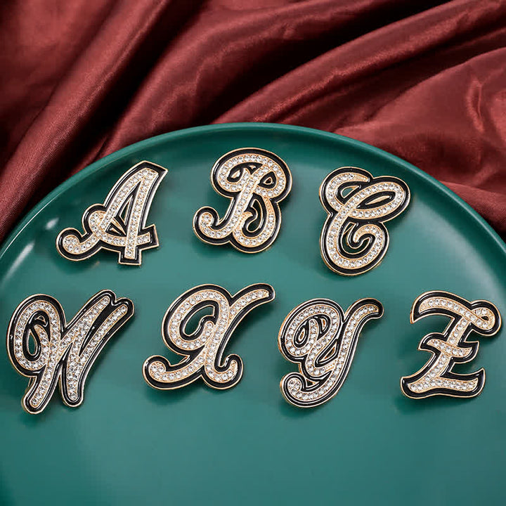 Broche alphabet 26 lettres initiales en strass émaillé noir