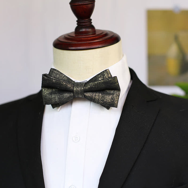 Nœud papillon noir subtil et doré pour homme, détails brillants et scintillants