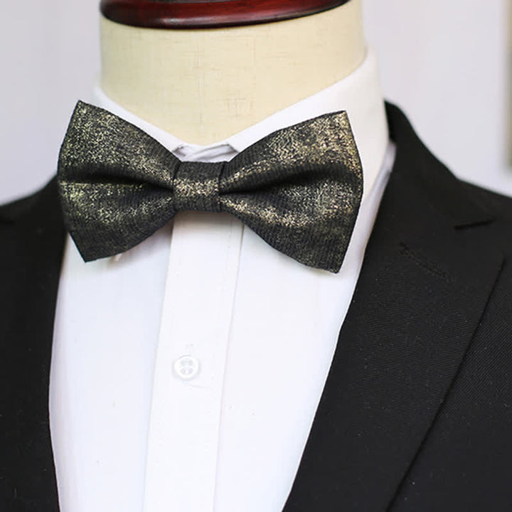 Nœud papillon noir subtil et doré pour homme, détails brillants et scintillants