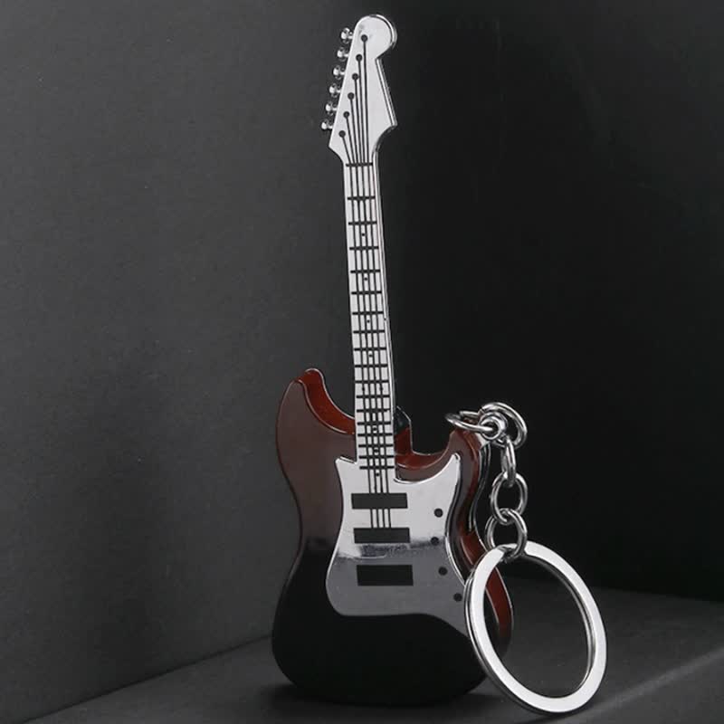Porte-clés briquet gonflable au butane en forme de guitare
