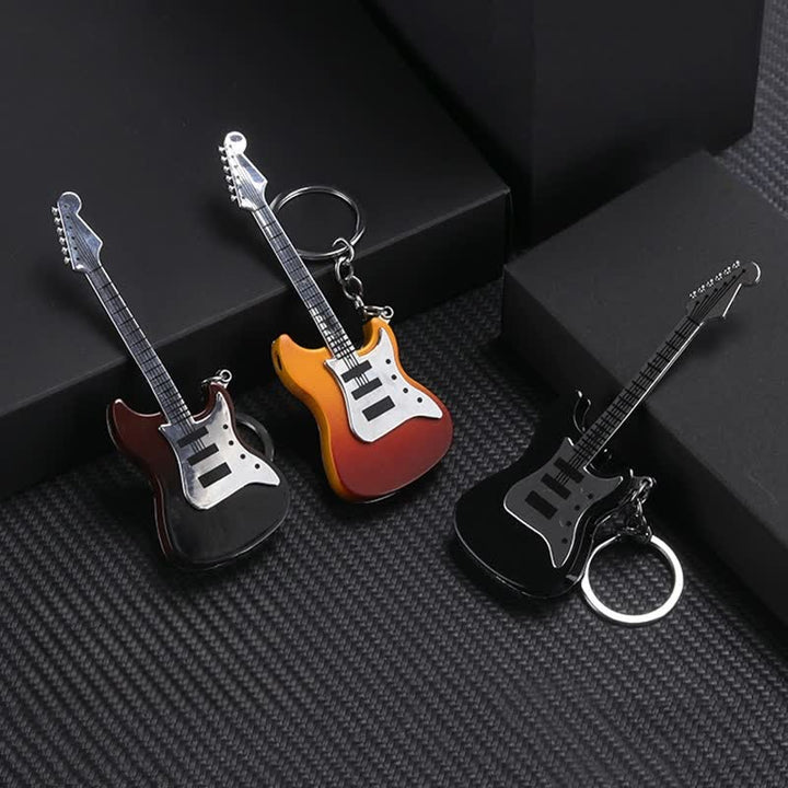 Porte-clés briquet gonflable au butane en forme de guitare