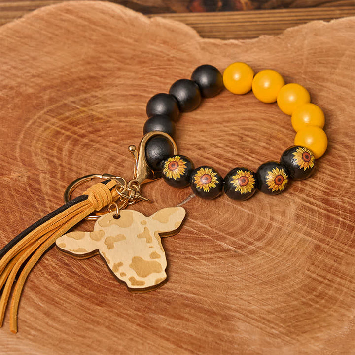 Bracelet western en perles de bois de vache avec pompon - Tournesol - image 0