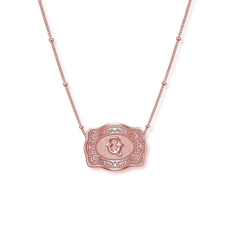 Collier mini lettre initiale en relief en or rose