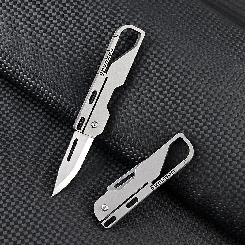 Couteau pliant multifonctionnel en alliage de titane avec porte-clés EDC - image 1