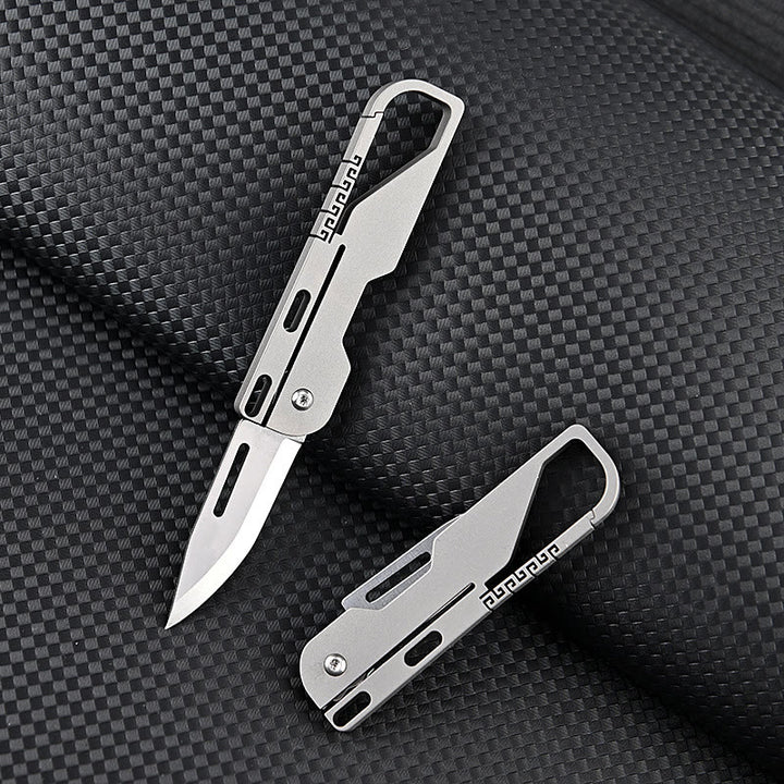 Couteau pliant multifonctionnel en alliage de titane avec porte-clés EDC - image 1
