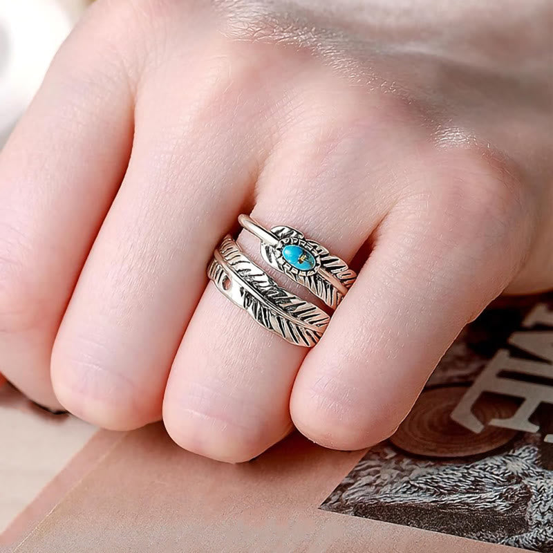 Bague en argent style bohème avec plumes turquoises incrustées - image 1