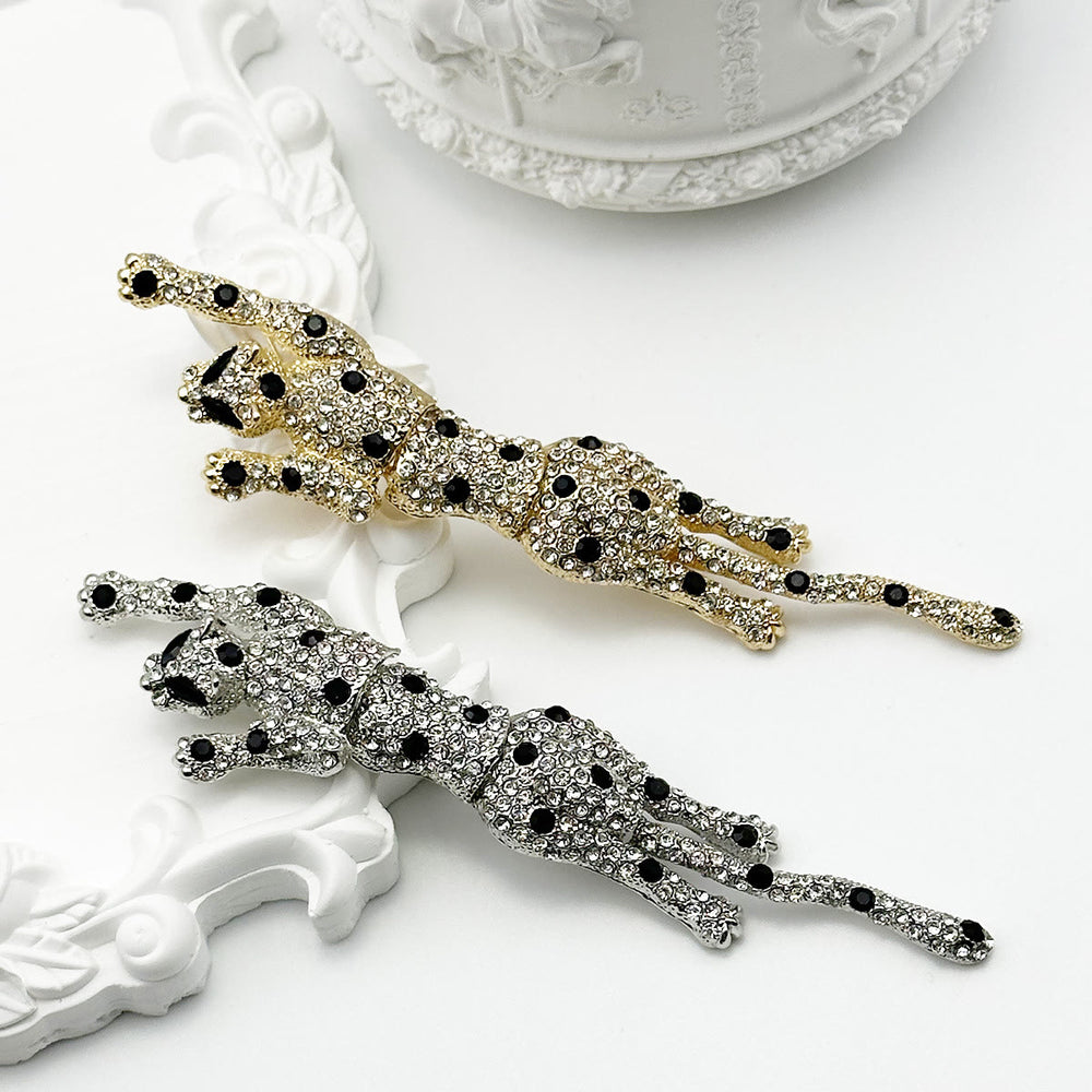 Broche articulée guépard à pois noirs sertie de diamants - image 1