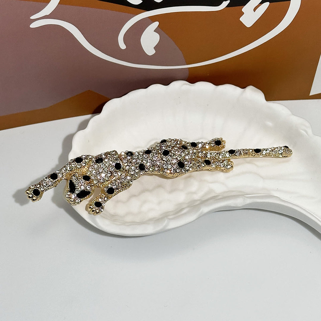 Broche articulée guépard à pois noirs sertie de diamants - Doré - image 0