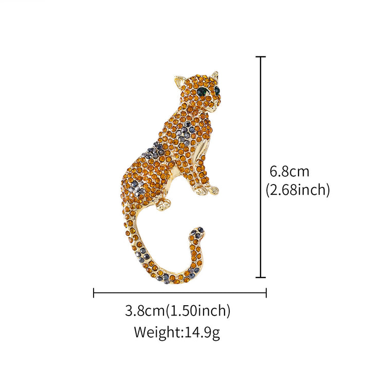 Broche guépard aux yeux verts émeraude sertie de diamants dorés - image 5