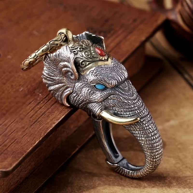 Porte-clés tête d'éléphant sculpté à la main - Yeux bleus - image 0