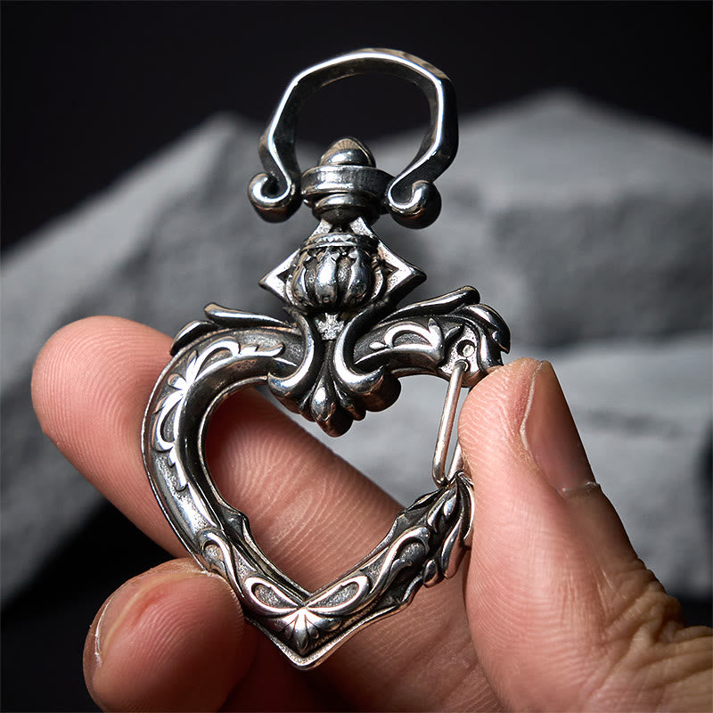 Porte-clés vintage rotatif en métal poli en forme de cœur - image 1