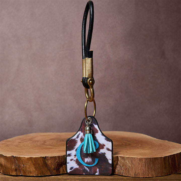Porte-clés avec pendentif en forme de fer à cheval et imprimé de lettres de vache western - image 3