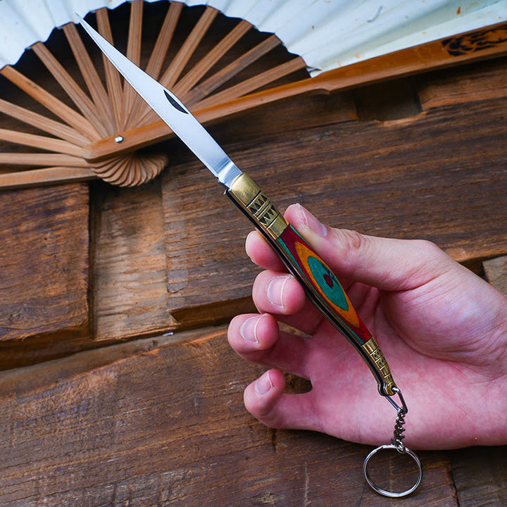 Couteau pliant en laiton coloré, main de Bouddha et collier en redstone - image 1