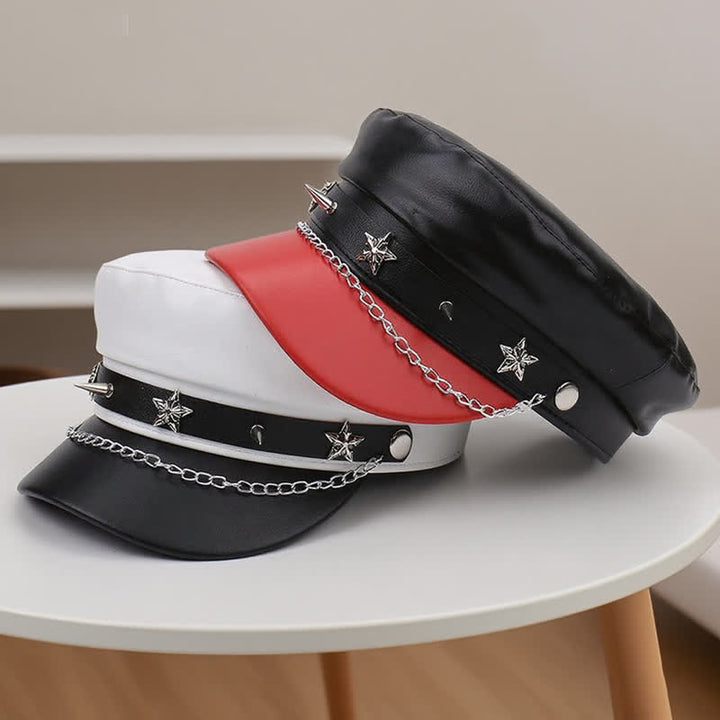 Béret en cuir bicolore à clous étoiles et chaînette - image 6
