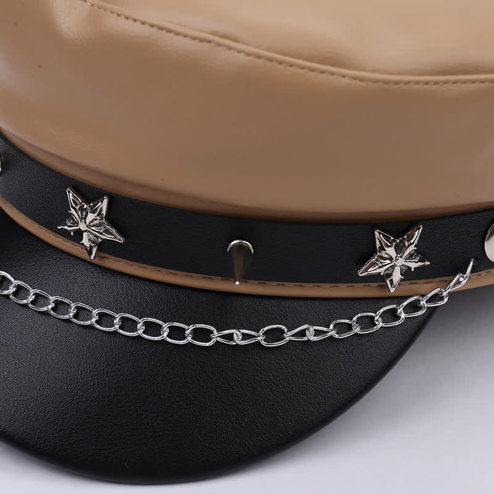 Béret en cuir bicolore à clous étoiles et chaînette - image 2