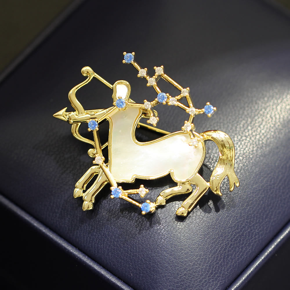 Broche en nacre et cristal bleu, or, représentant les 12 constellations - image 17