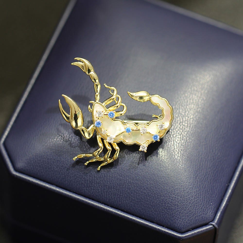Broche en nacre et cristal bleu, or, représentant les 12 constellations - image 15