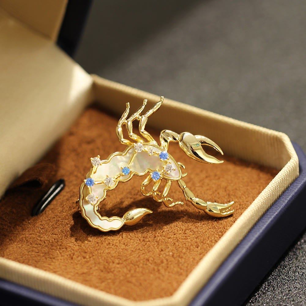 Broche en nacre et cristal bleu, or, représentant les 12 constellations - Scorpion - image 14