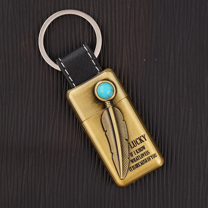 Briquet gonflable à butane en forme de plume turquoise avec porte-clés - Bronze - image 1