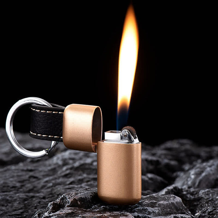 Briquet à butane gonflable mini porte-clés de poche - Or - image 0