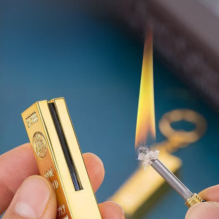 Briquet en métal doré avec porte-clés, motif lingot d'or - image 0