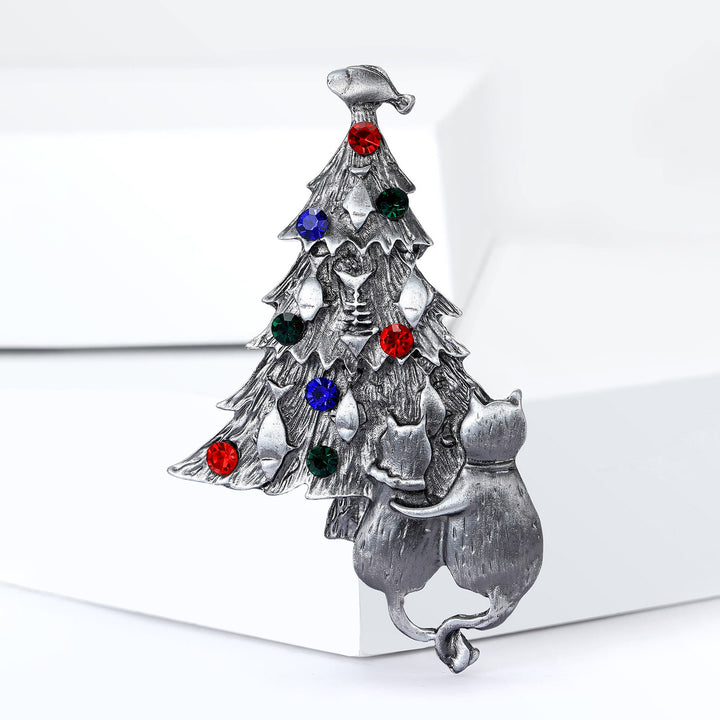 Broche bicolore festive en émail représentant un sapin de Noël avec chat et poisson - image 8
