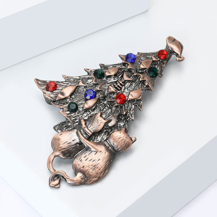 Broche bicolore festive en émail représentant un sapin de Noël avec chat et poisson - image 6