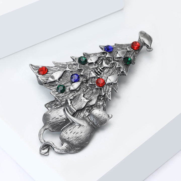 Broche bicolore festive en émail représentant un sapin de Noël avec chat et poisson - image 10