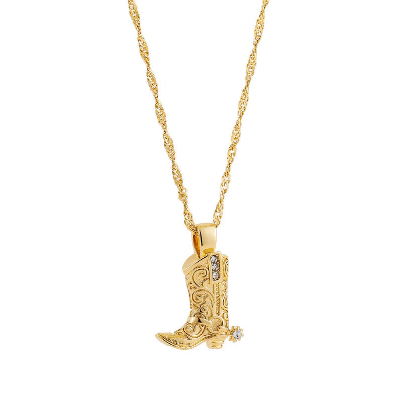 Collier pendentif exquis en forme de botte de cowboy dorée et d'étoiles. - image 0