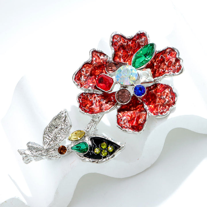 Broche argentée à motif floral en cristal multicolore - image 2