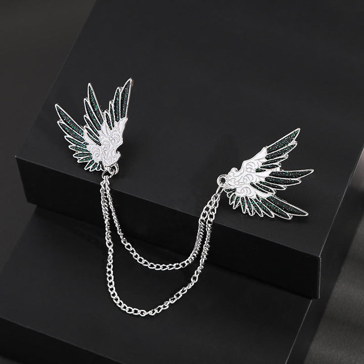 Broche ornée à double chaîne et à motif d'ailes symétriques - image 1