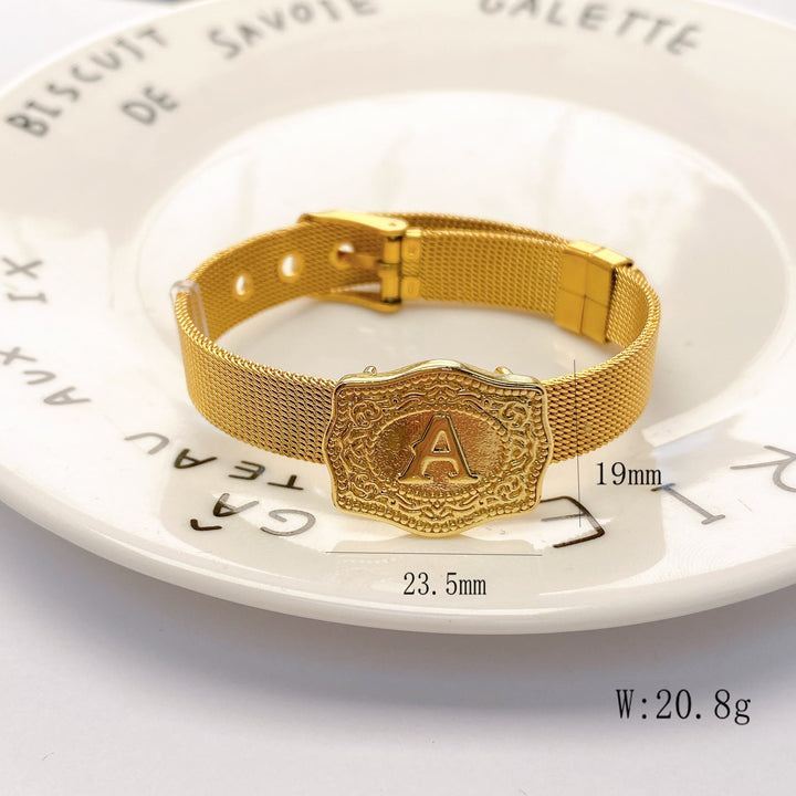 Bracelet glamour doré avec initiale gravée - image 26