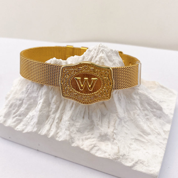 Bracelet glamour doré avec initiale gravée - W - image 22