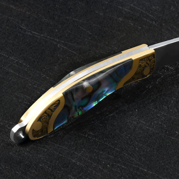 Porte-clés couteau pliant rétro avec pendentif tête de taureau et texture coquillage - image 6