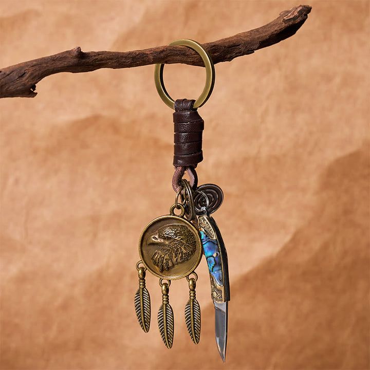 Porte-clés couteau pliant rétro avec pendentif rond en forme de coquillage et pendentif tête d'aigle, texture coquillage - image 3