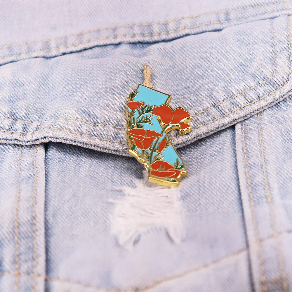 Broche émaillée dorée représentant le pavot de Californie - image 1