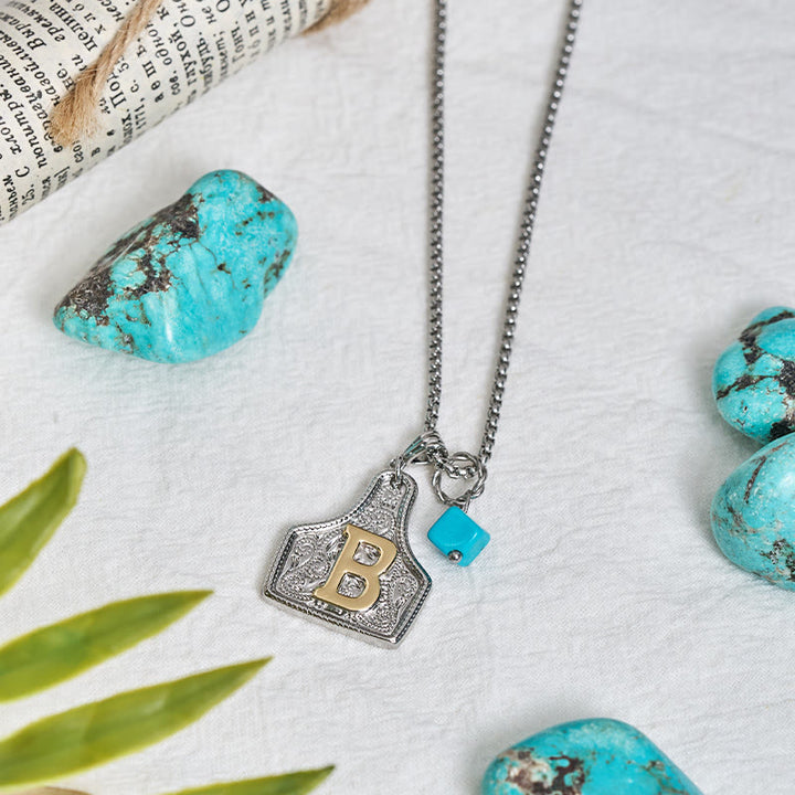 Collier pendentif turquoise bicolore style western - image 2