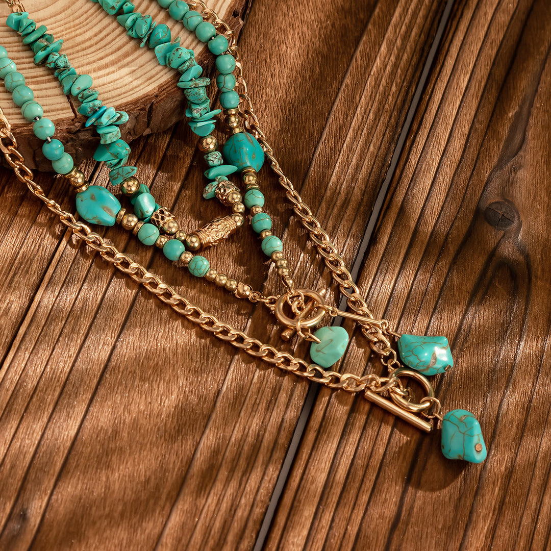 Collier à plusieurs rangs en or et turquoise avec pendentif en forme de Y - image 1