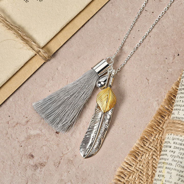 Collier vintage bohème en argent à pompon et plumes - image 2