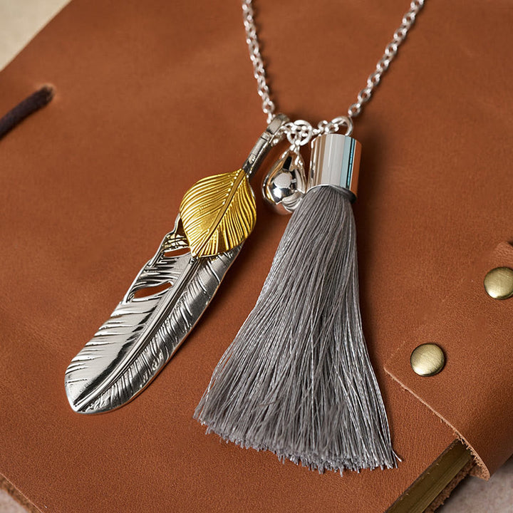 Collier vintage bohème en argent à pompon et plumes - image 4