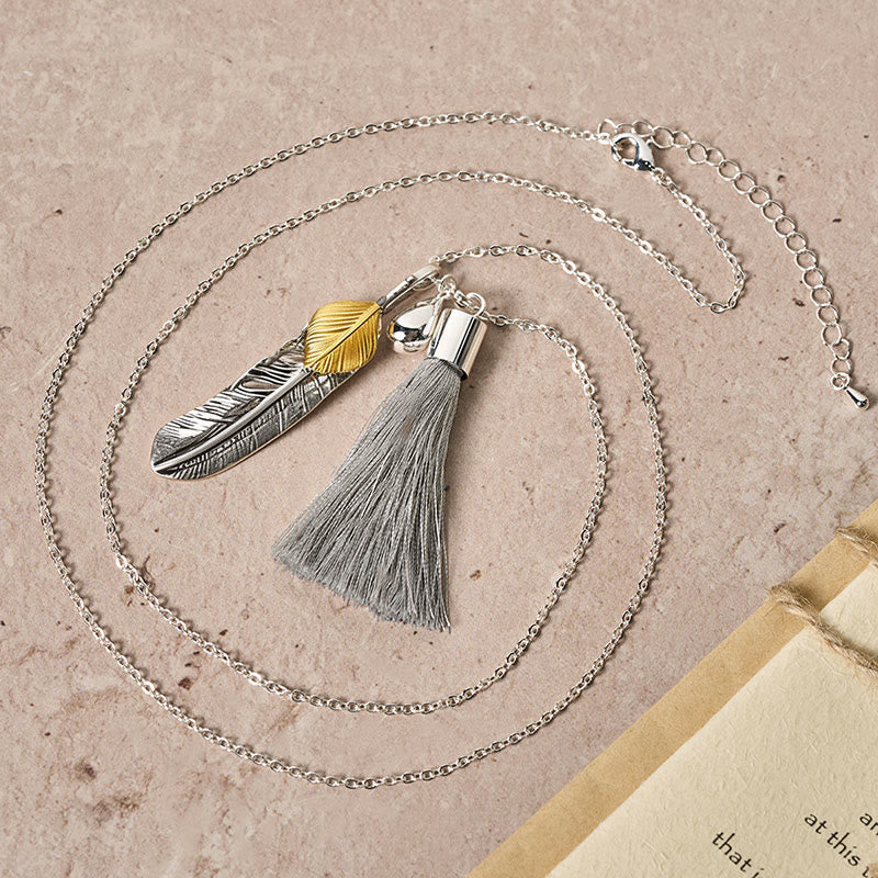 Collier vintage bohème en argent à pompon et plumes - image 3