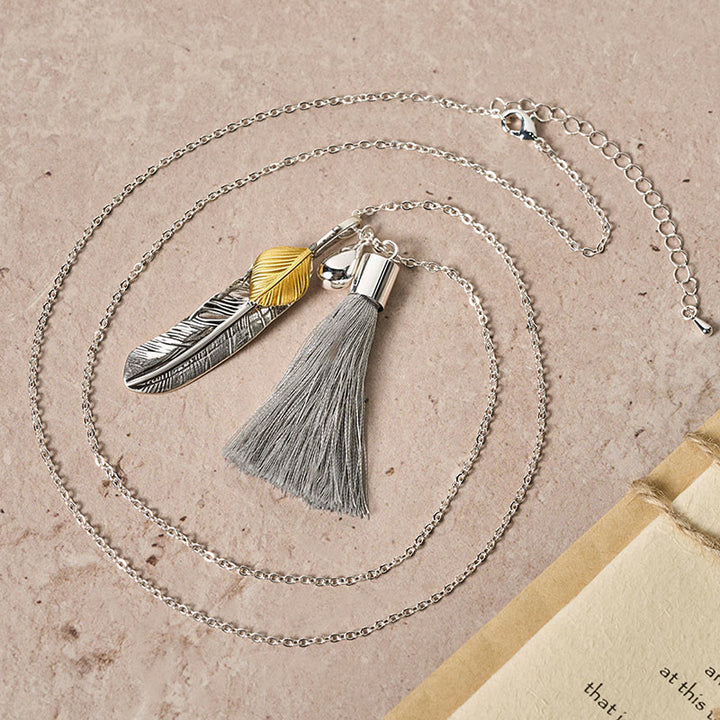 Collier vintage bohème en argent à pompon et plumes - image 3