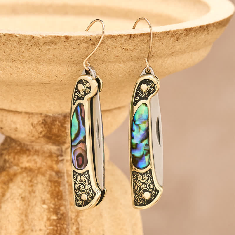 Boucles d'oreilles artisanales en forme de couteau de poche en nacre irisée. - Bronze - image 0