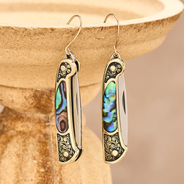 Boucles d'oreilles artisanales en forme de couteau de poche en nacre irisée. - Bronze - image 0