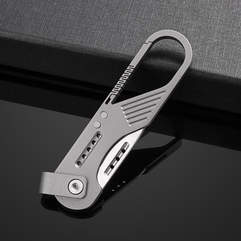 Couteau pliant EDC style titane avec mousqueton - image 1