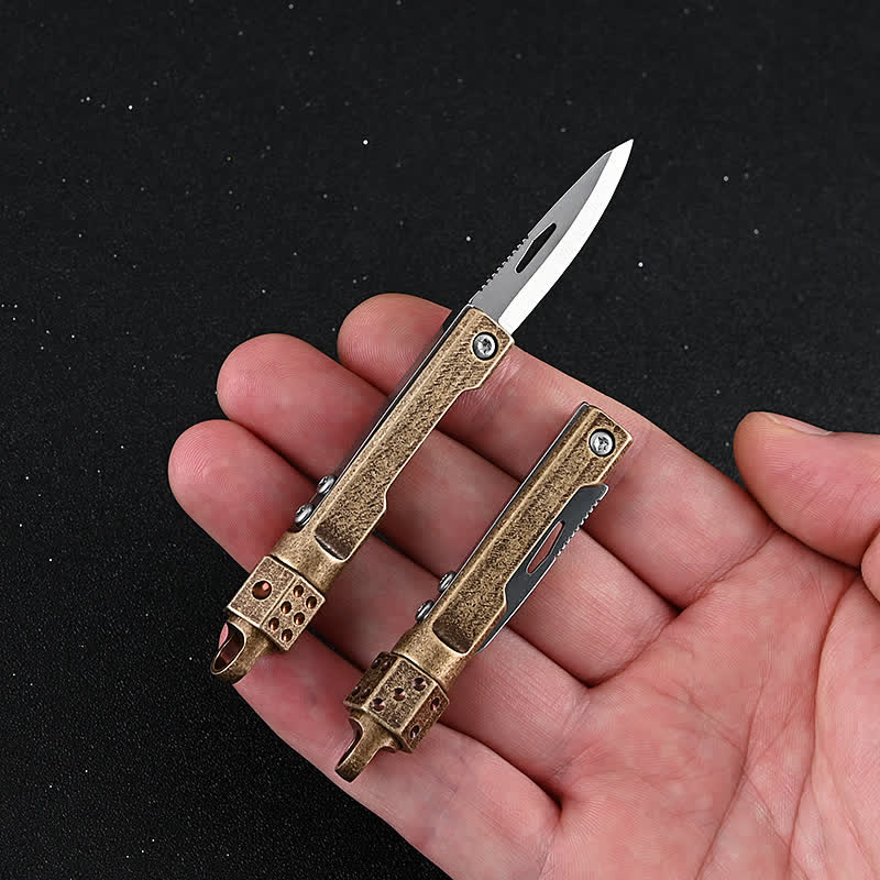 Couteau pliant miniature vintage à manche en laiton et dés rotatifs - Outil EDC - image 0