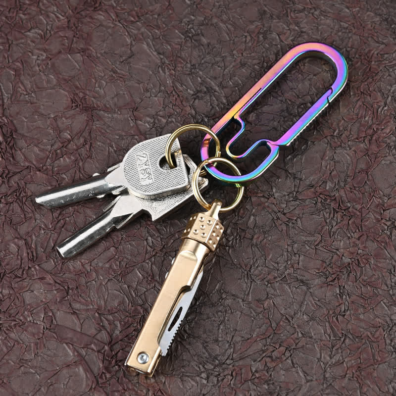 Couteau pliant miniature vintage à manche en laiton et dés rotatifs - Outil EDC - image 1