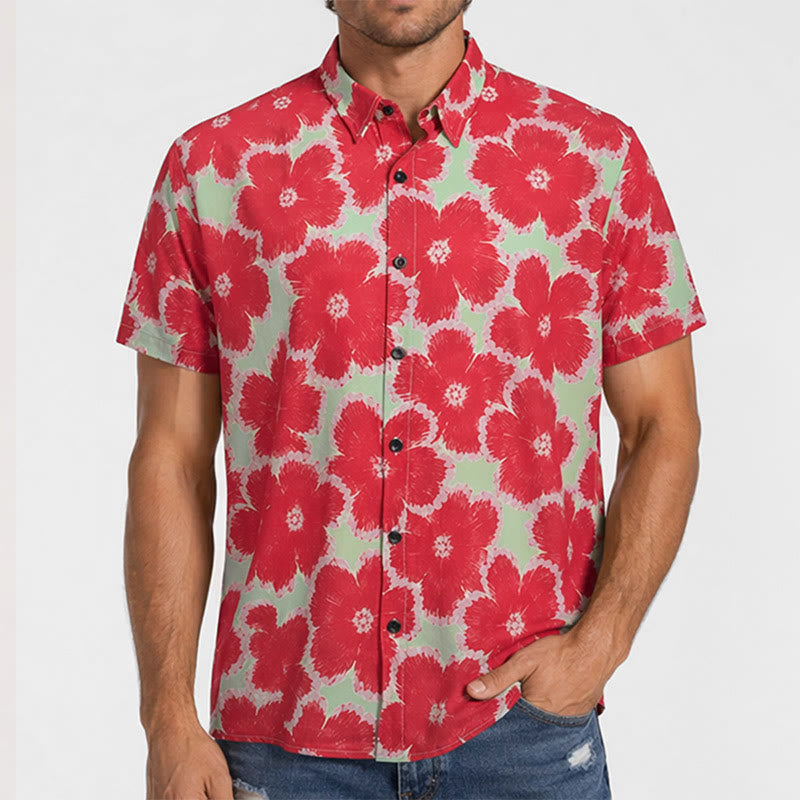 Chemise de vacances à motif de fleurs rouges éclatantes et fond vert - image 1