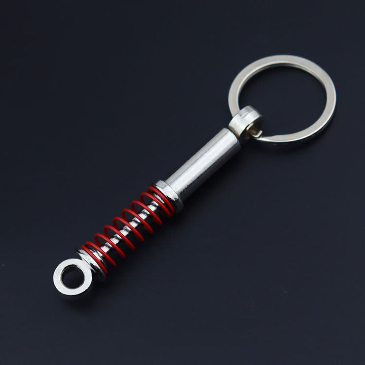 Collection de porte-clés au design de pièces automobiles modernes miniatures - Amortisseur rouge - image 15